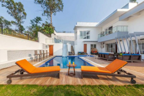 StayVista's White Pebbles - A Villa with Theater Room & Swimming Pool